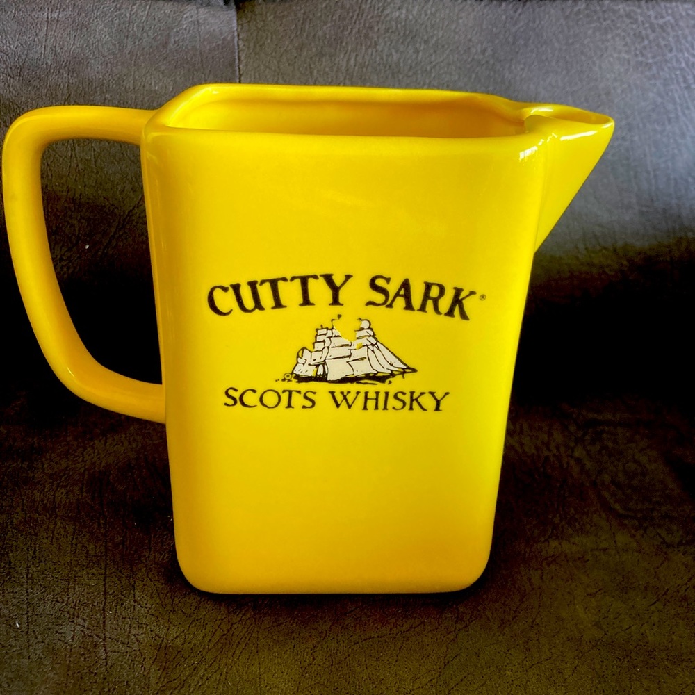Vintage Cutty Sark pitcher yellow made in Mexico measures 6”x 4”